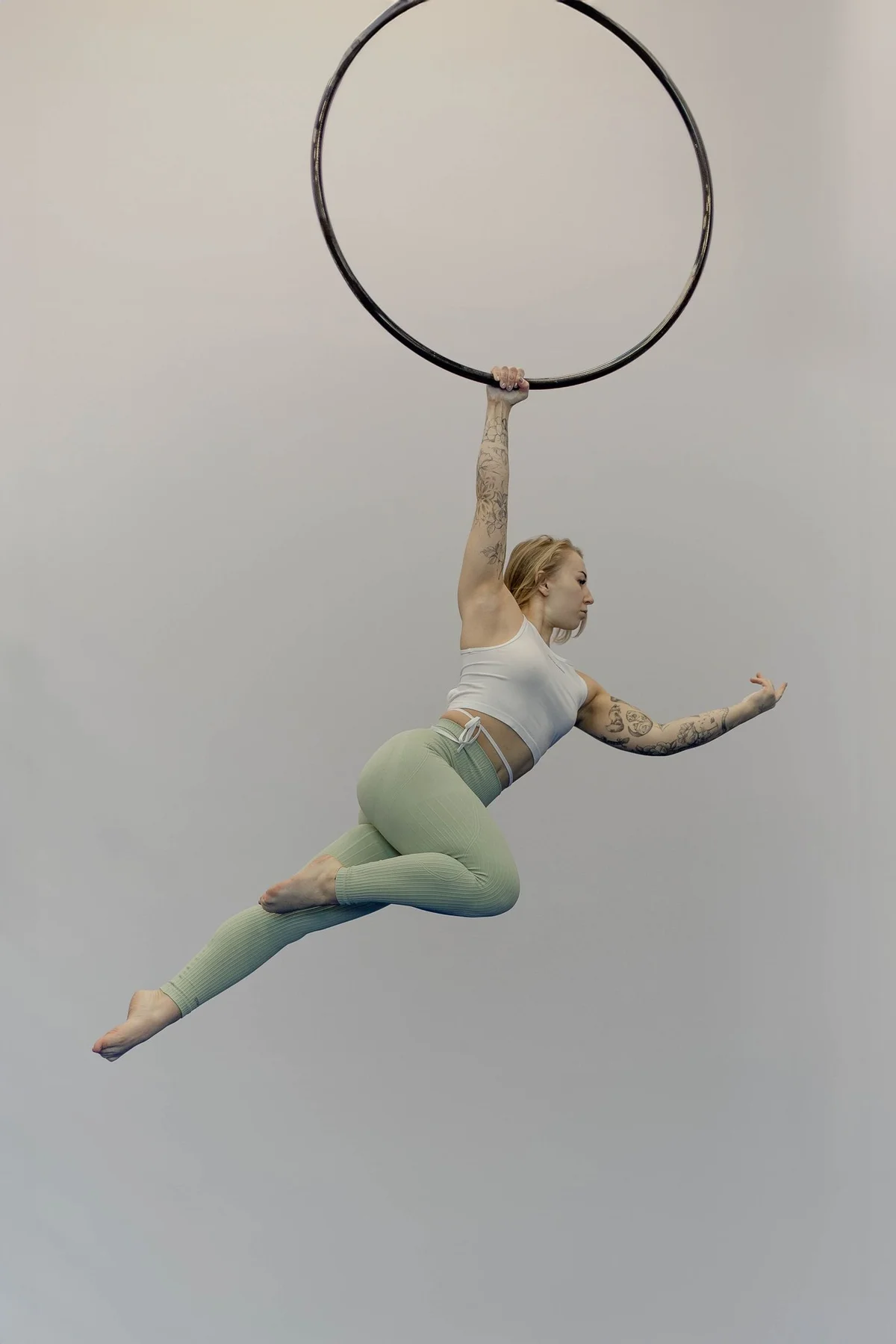 Grafika promocyjna wydarzenia Warsztaty Aerial Hoop z Klaudią Zając – dynamika i flow